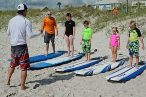 Learn to surf in Jacksonville Beach, Florida. Surf camps, private surf lessons, surf birthday parties, group surf classes.