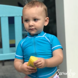 SwimZip, the best rash guards for kids to wear to the beach and swimming. Rash guards have high SPF and maximum sun protection.