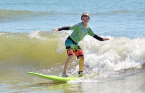 Learn to surf in St. Augustine Beach, Florida. Surf camps, private surf lessons, surf birthday parties, group surf classes.